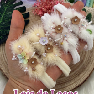 Laço na faixa para bebê Pelucia